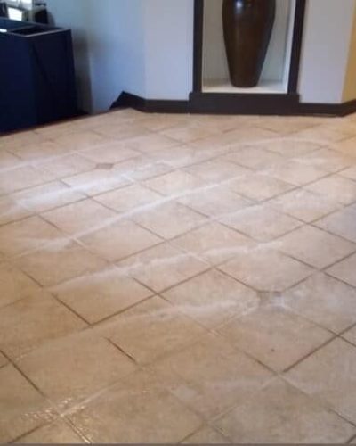 Floor Cleaning After Pre spray and scrubbing the tile